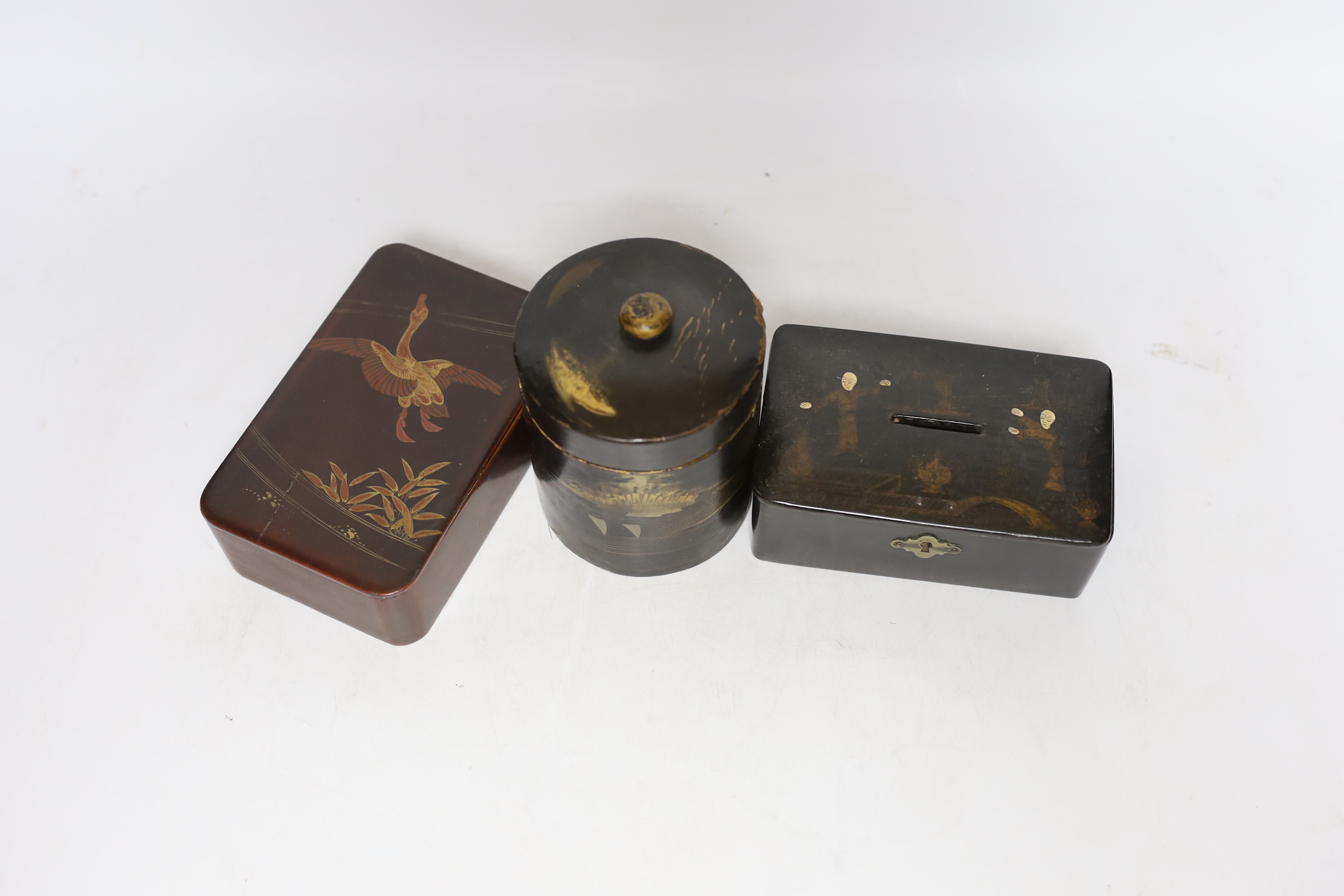 Six pieces of Japanese lacquerware comprising boxes and a small dish, largest 13cm wide